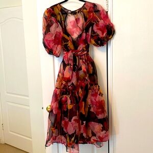 Beautiful, waist-cinching silk organza midi gown is perfect for a summer wedding